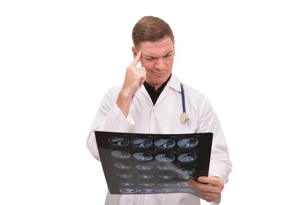 Portrait of young male doctor working on white background — Stock Photo, Image