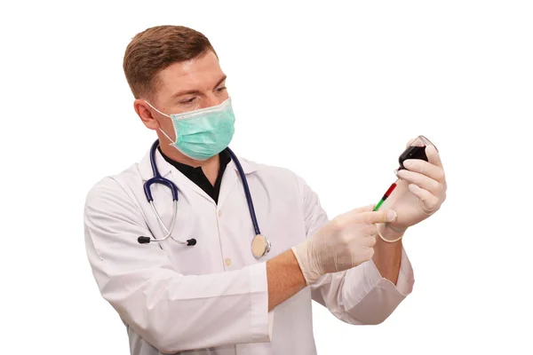 Portrait of young male doctor working on white background — Stock Photo, Image