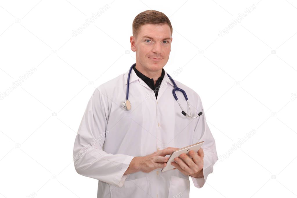 Portrait of young male doctor using tablet on white background