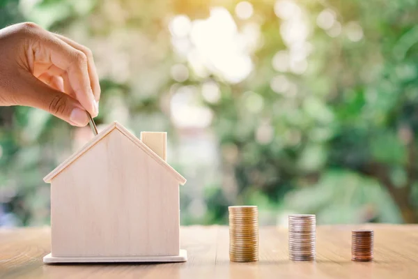 Hand and coins concept save money for my home — Stock Photo, Image