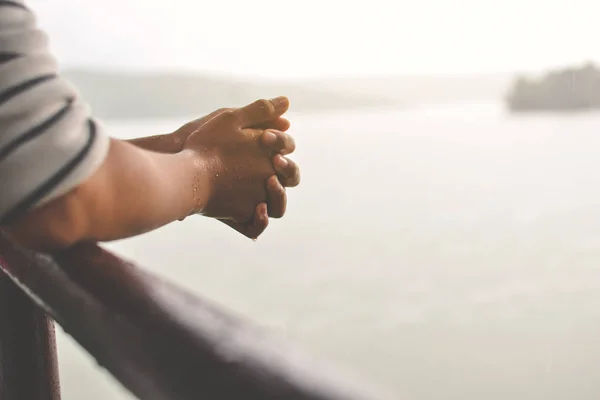 Close up girl hand during rain fall — Stock Photo, Image