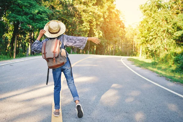 Happy Asian girl backpack in the road — Stock Photo, Image