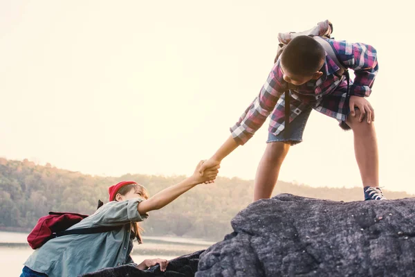 Boy Helping Girl Top Mountain Nature — Stock Photo, Image