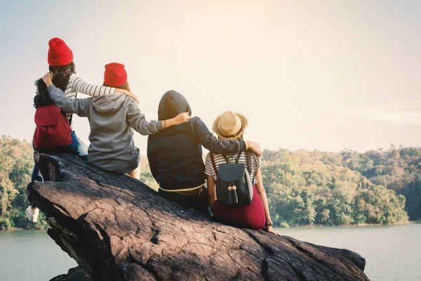 Group of friends enjoy in nature , Relax time on holiday concept ,selective and soft focus,tone of hipster style