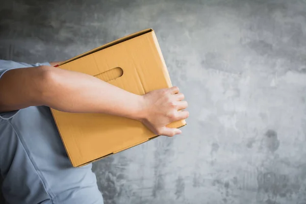 Delivery man sending box from online shopping service
