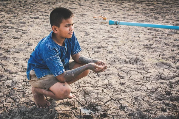 Sad Boy Want Drink Some Water Crack Ground Concept Drought — Stock Photo, Image