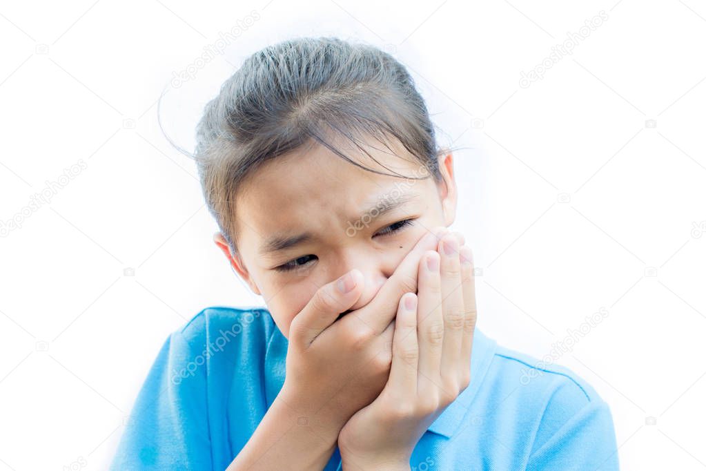 Asian girl felling toothache on white background,Tooth decay and oral health in children.