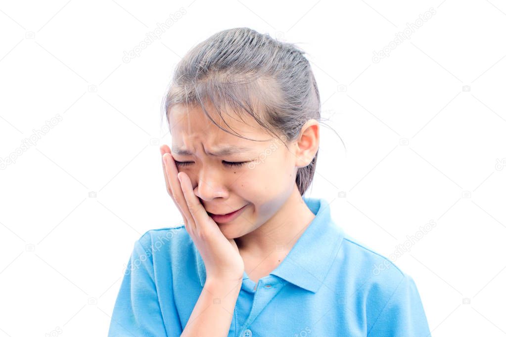 Asian girl felling toothache on white background,Tooth decay and oral health in children