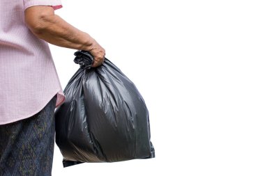 Eski beyaz arka plan üzerinde plastik torba tutarak el