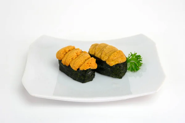 Uni sea urchin sushi japanese cuisine in ceramic plate — 스톡 사진