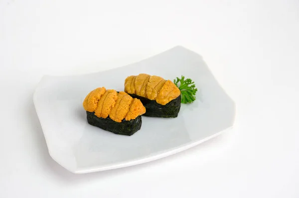 Uni sea urchin sushi japanese cuisine in ceramic plate — 스톡 사진