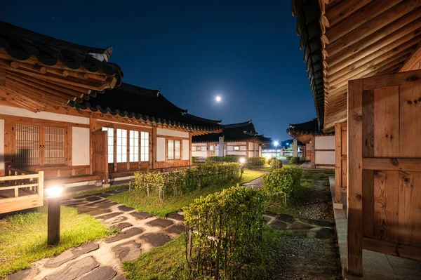 Architecture traditional wooden house illumination with the moon