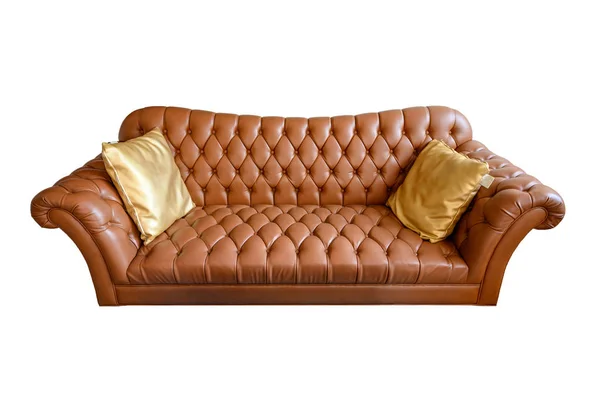 Orange vintage leather sofa buttoned with golden pillows. Isolat — 스톡 사진