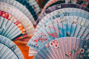 Colourful souvenir fans for sale