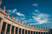 Statues on colonnades at Saint Peters Square in Vatican