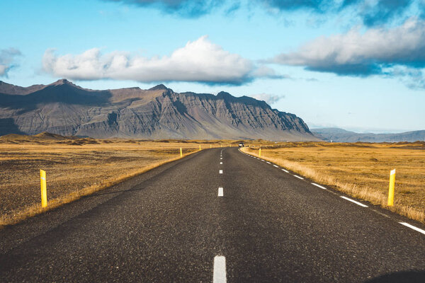 Empty road passing through amazing landscape in Iceland