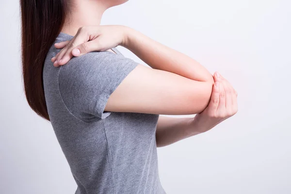 Asian woman with elbow pain. — Stock Photo, Image
