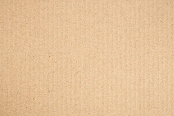 La scatola di carta marrone è vuota, sfondo di cartone astratto — Foto Stock