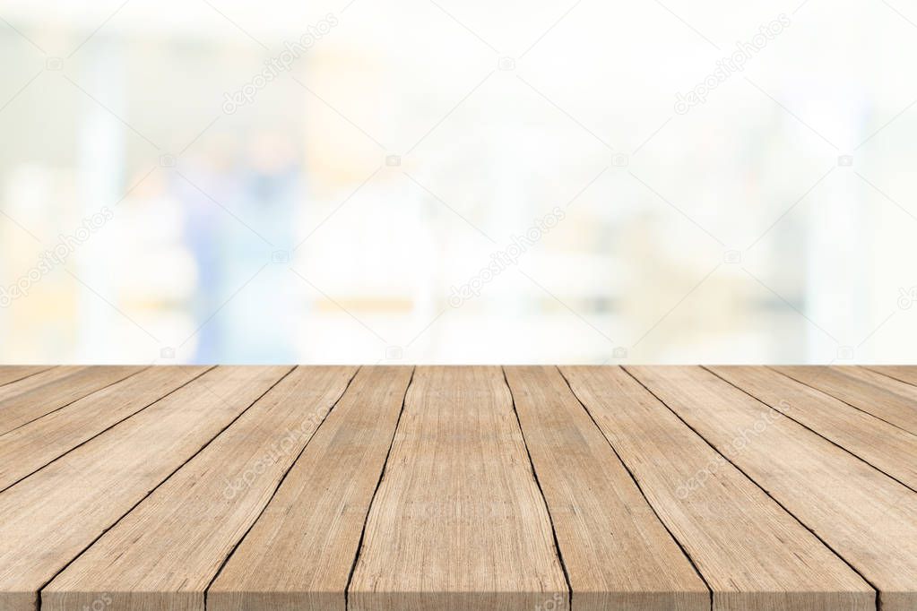 Empty wood table top on white blurred background