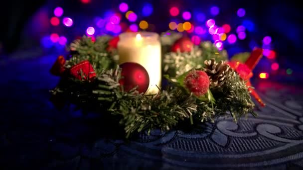 Christmas composition with candle and lights — Stock Video