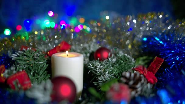 Christmas composition with candle and lights — Stock Video