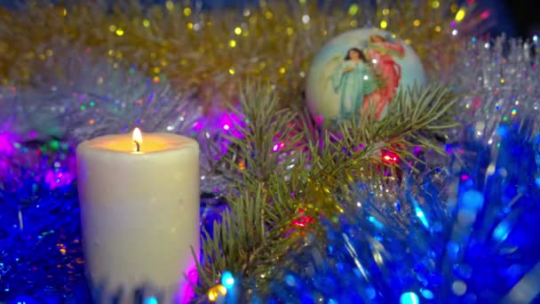 Christmas composition with candle and lights — Stock Video