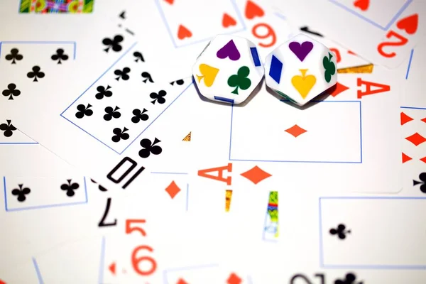 Playing cards and dice are on the table — Stock Photo, Image