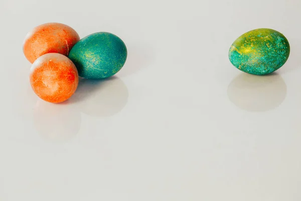 Red and green Easter eggs on white background — Stock Photo, Image