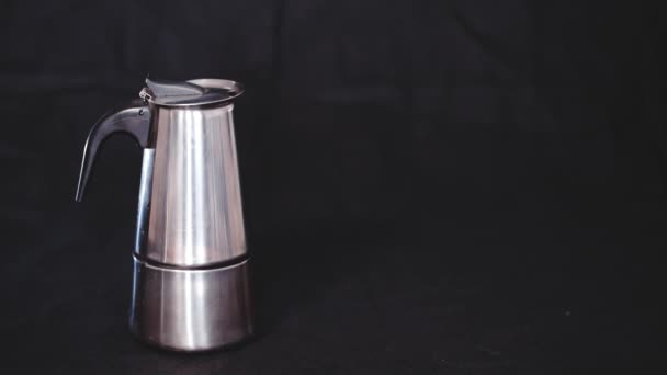 Geyser coffee maker on black background — Stock Video