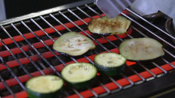 Zucchini fried on the grill, slow motion — Stock Video