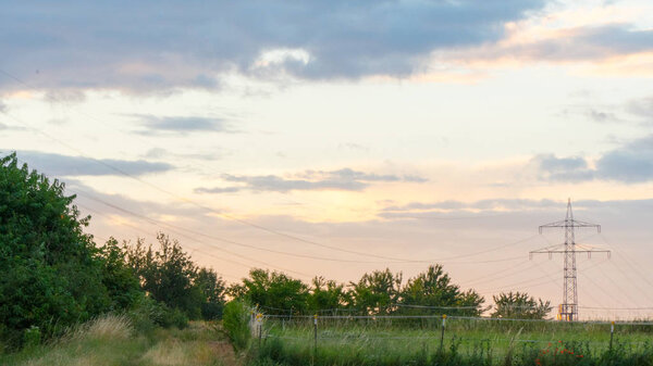 Beautiful sunset over a field and a small town in Germany