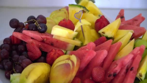 Grapes, watermelon, pineapple and strawberries — Stock Video