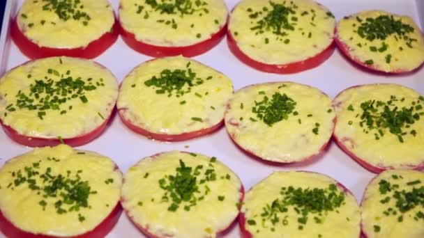 Breakfast buffet: tomatoes with cheese and herbs — Stock Video