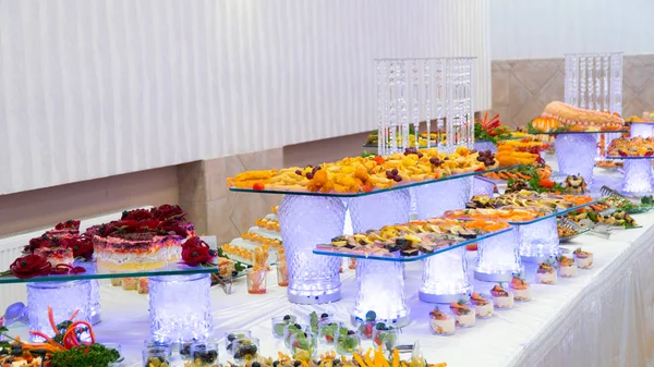 Buffet: snacks and salads are on the table Royalty Free Stock Photos