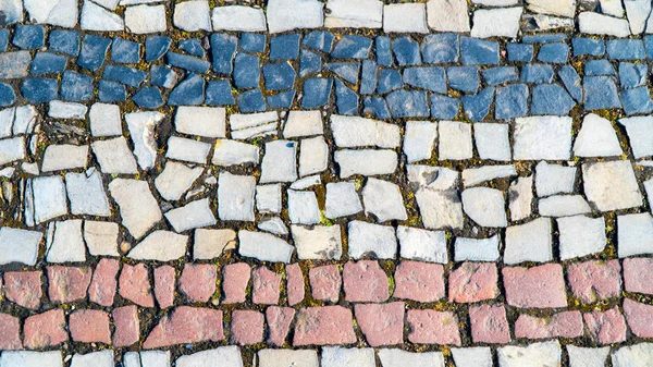 Le fond est une mosaïque de pavés — Photo