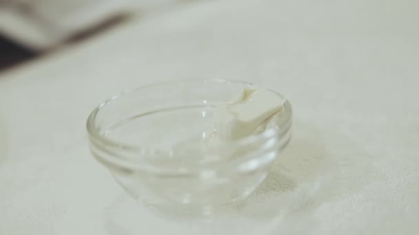 A glass of milk on a table — Stock Video