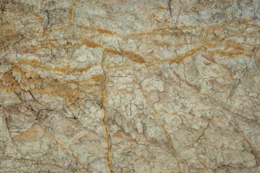 Sert kil kaya ve toprak toprak toprak dokunun altında, toprak kahverengi kuru çamur desenli arka plan