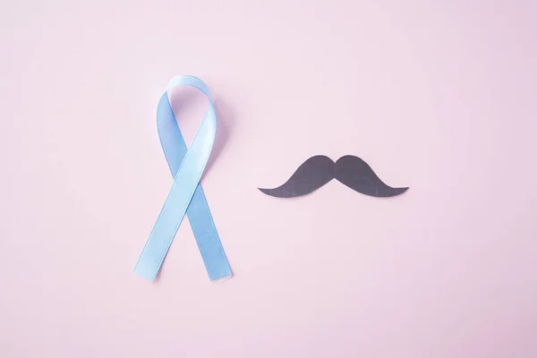 Prostate Cancer Awareness Light Blue Ribbon Mustache Pink Background Support — Stock Photo, Image