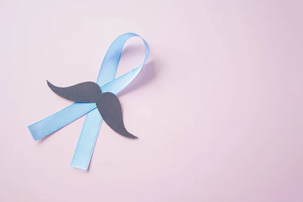 Prostate Cancer Awareness Light Blue Ribbon Mustache Pink Background Support — Stock Photo, Image