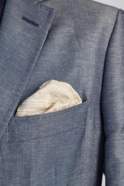 taylored menswear jacket. Detail with with pocket and handkerchi