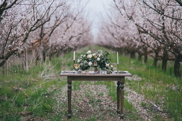 Stylish and romantic table setting with flowers, date, weekend