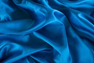 Mavi saten kumaş, ipek kumaş, kavadura kumaş kıvrımları