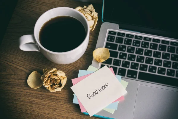 A cup of tea and a computer, a word on paper — Stock Photo, Image