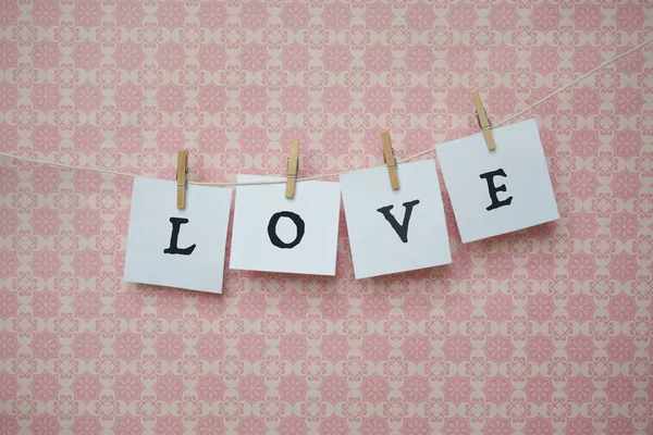 White sheets of paper on a pink background, white sheets on clot — Stock Photo, Image