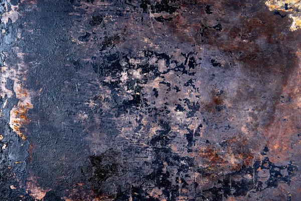 Scratched, chipped, rusty metal surface with peeling black ename — 스톡 사진