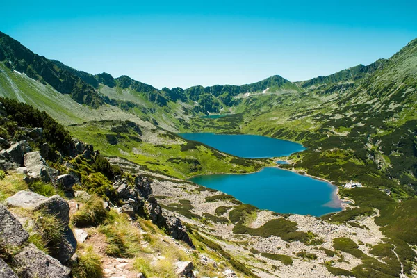 Tatras mountains, Valley of five ponds. View on mountains and five lakes. Trail to see eye from the mountain hostel in five ponds.  Five breathtaking mountain lakes in the High Tatras.