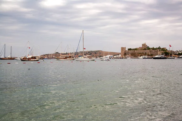 BODRUM, TURKEY - SEPTEMBER 20, 2016 ; The old fortified castle. Coast and harbor with boats,View of the port Bodrum Kale, castle.