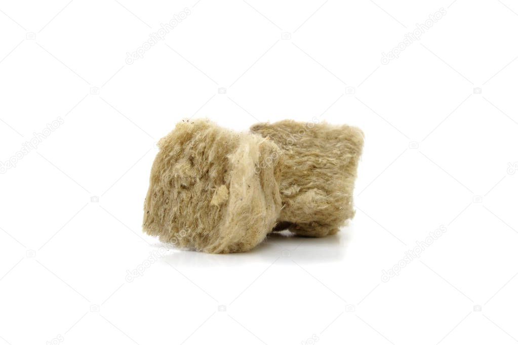 Mineral wool for insulation. The fiberglass is isolated on white.