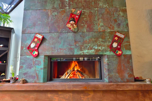 Decorated fireplace for Christmas. Place for text. Suitable for Christmas background.