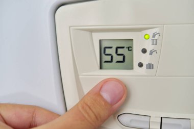 Gaz fırını panelinde Merkezi Isıtma düzeyini ayarlama